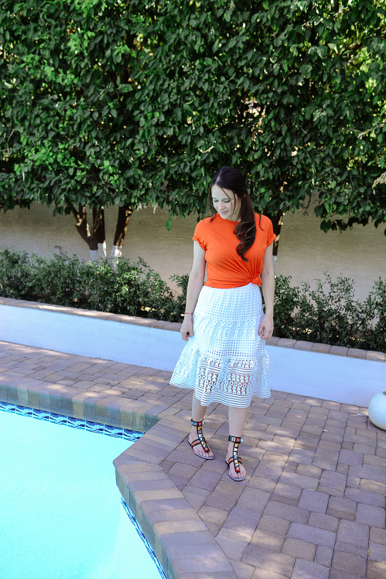 Call me Lore wearing DVF white skirt and Fendi Sandals