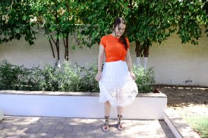 Call me Lore wearing DVF white skirt and Fendi Sandals